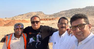 Mining site with trucks and machinery